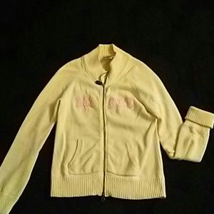 Disney Creme sweater with pink lettering
